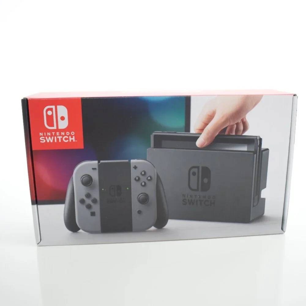 Nintendo Switch HAC-001 32GB Console with Gray Joy‑Con, Zelda case & 8 games inc